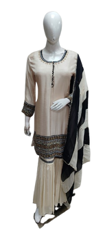 Premium silk kurta with mirror work paired with chinon sharara and organza dupatta