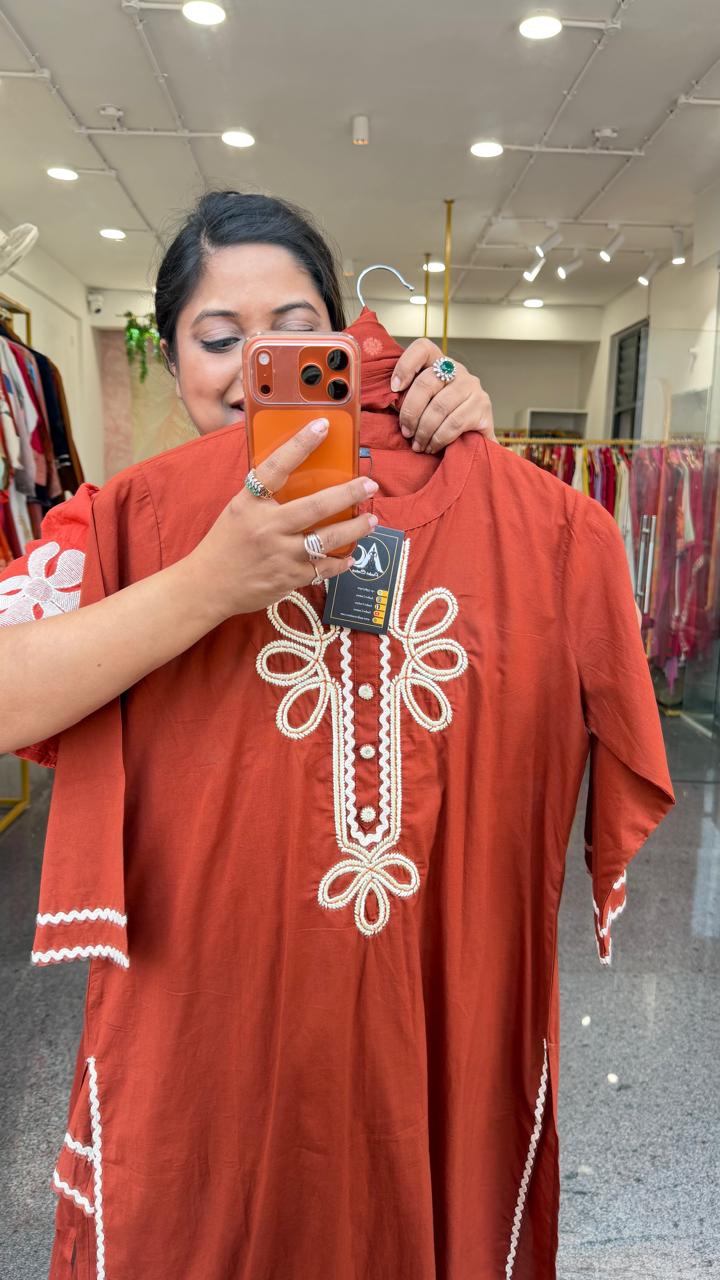 Orange colour embroidery suit in solid colour