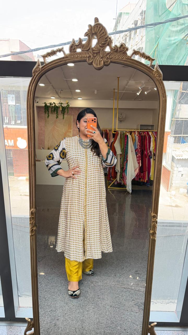 Super soft Mul silk loose fitted co ord set in yellow Kurta has two pockets