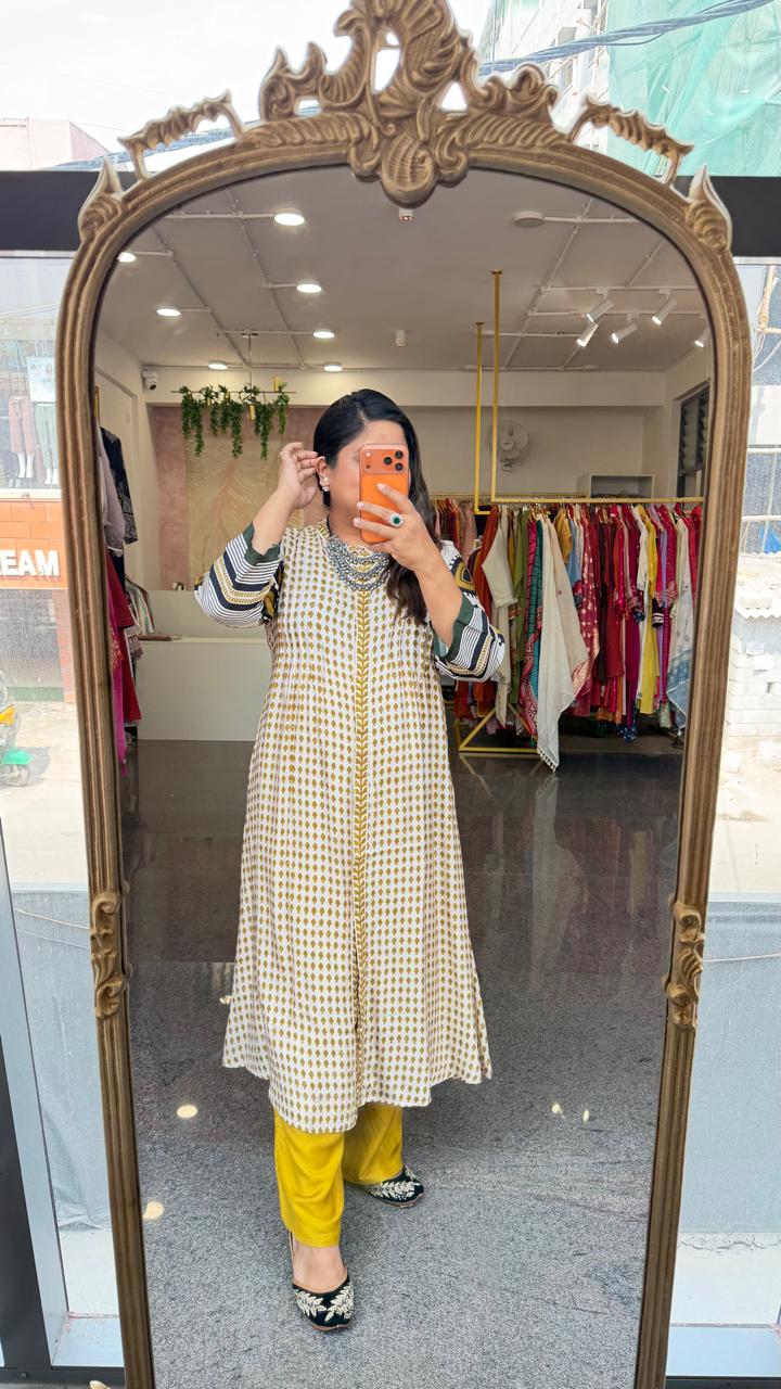 Super soft Mul silk loose fitted co ord set in yellow Kurta has two pockets