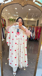Organic cotton embroidered shrug dress. A smart piece