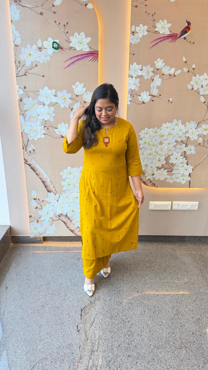 Pretty cotton embroidered kurta pant with mirror work in yellow