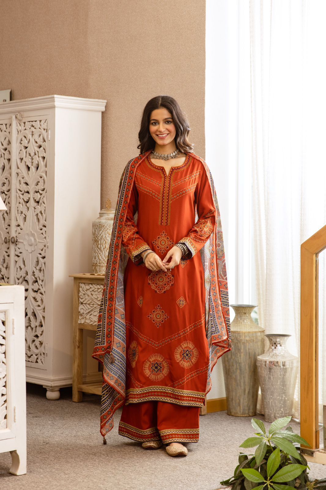 Heavy German rayon suit set paired with kalamkari dupatta in rust fully embroidered