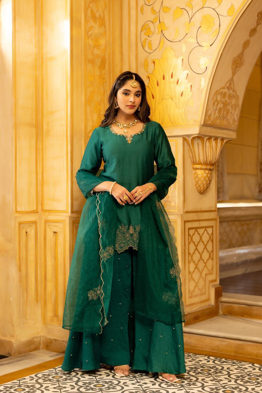 Gorgeous suit back in new colour! Santoori silk dress plazzo set with intricate embroidery in green