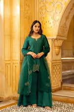 Gorgeous suit back in new colour! Santoori silk dress plazzo set with intricate embroidery in green