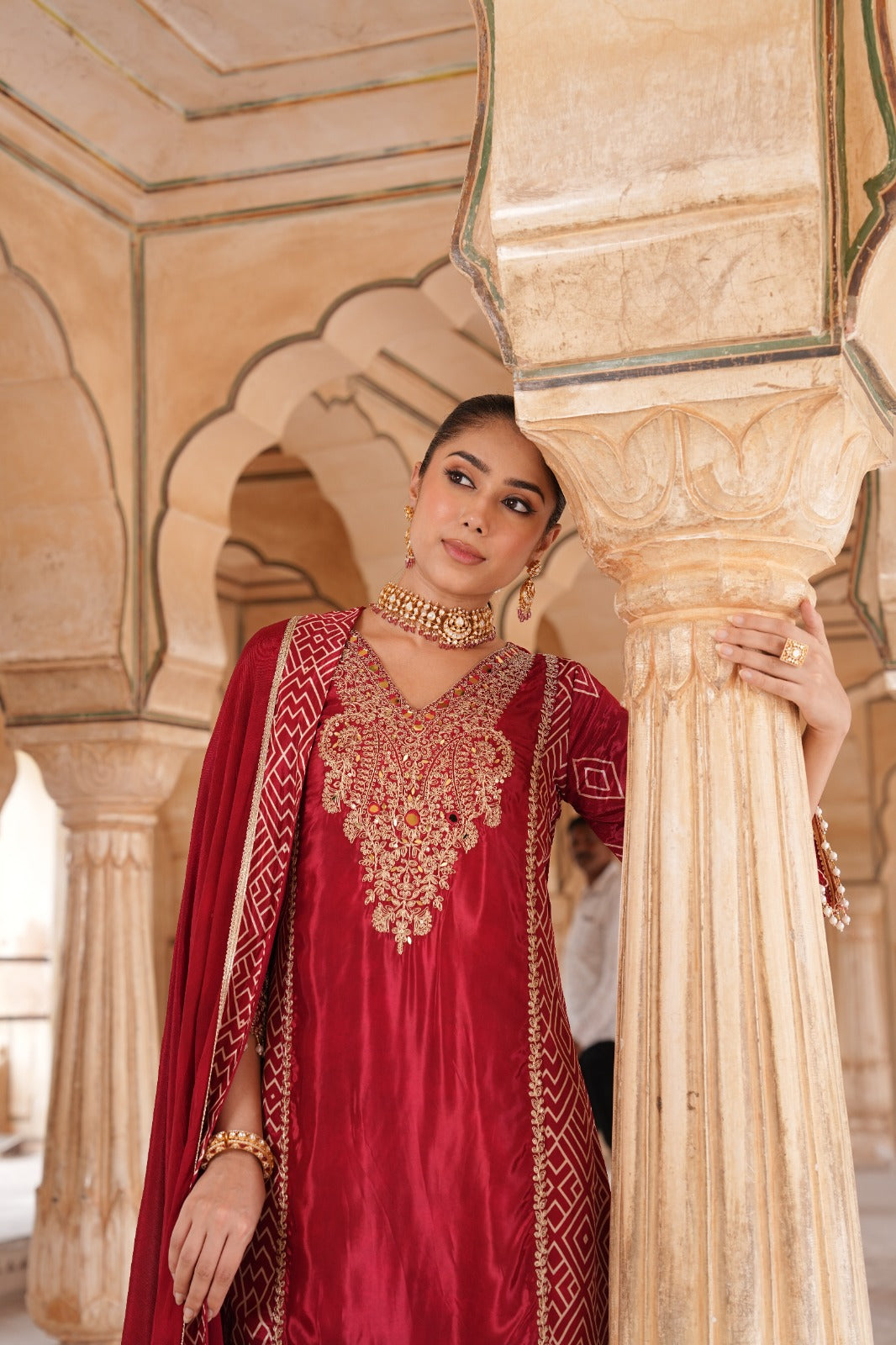 Pure crepe designer with intricate zari detailing suit set in red