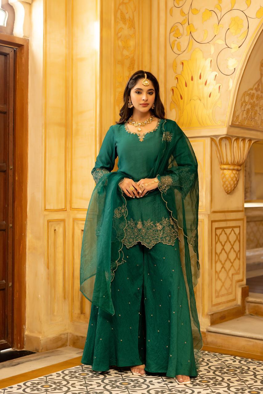 Gorgeous suit back in new colour! Santoori silk dress plazzo set with intricate embroidery in green
