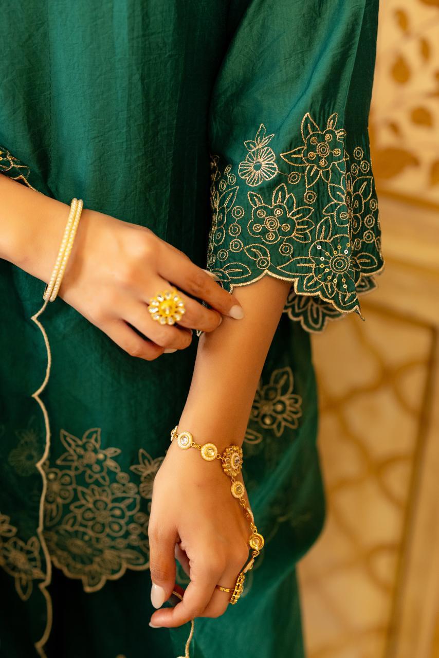 Gorgeous suit back in new colour! Santoori silk dress plazzo set with intricate embroidery in green