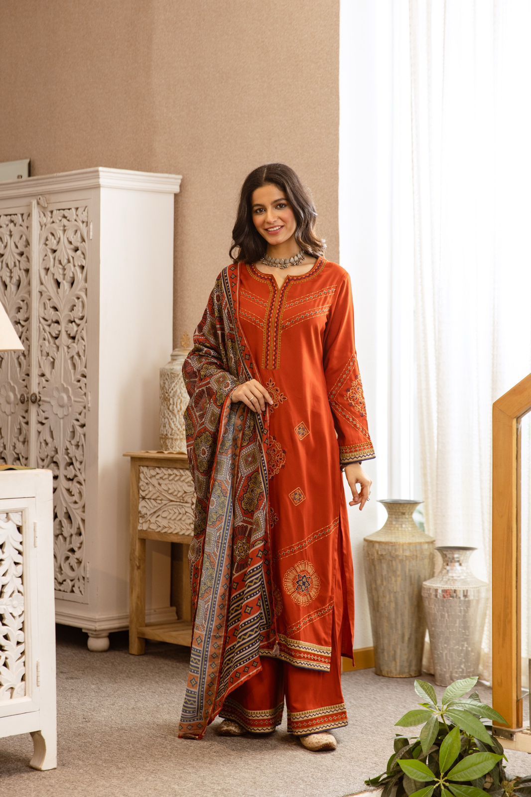 Heavy German rayon suit set paired with kalamkari dupatta in rust fully embroidered