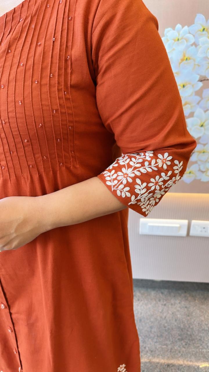 Pretty embroidery flex cotton kurta pant in rust