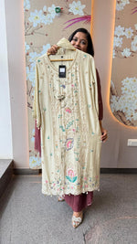 Pretty hand work dola silk suit set with pearl detailing and heavy handwork in cream