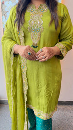 Designer suit set in soft silk fabric true to size in green paired with organza dupatta n zari detailing