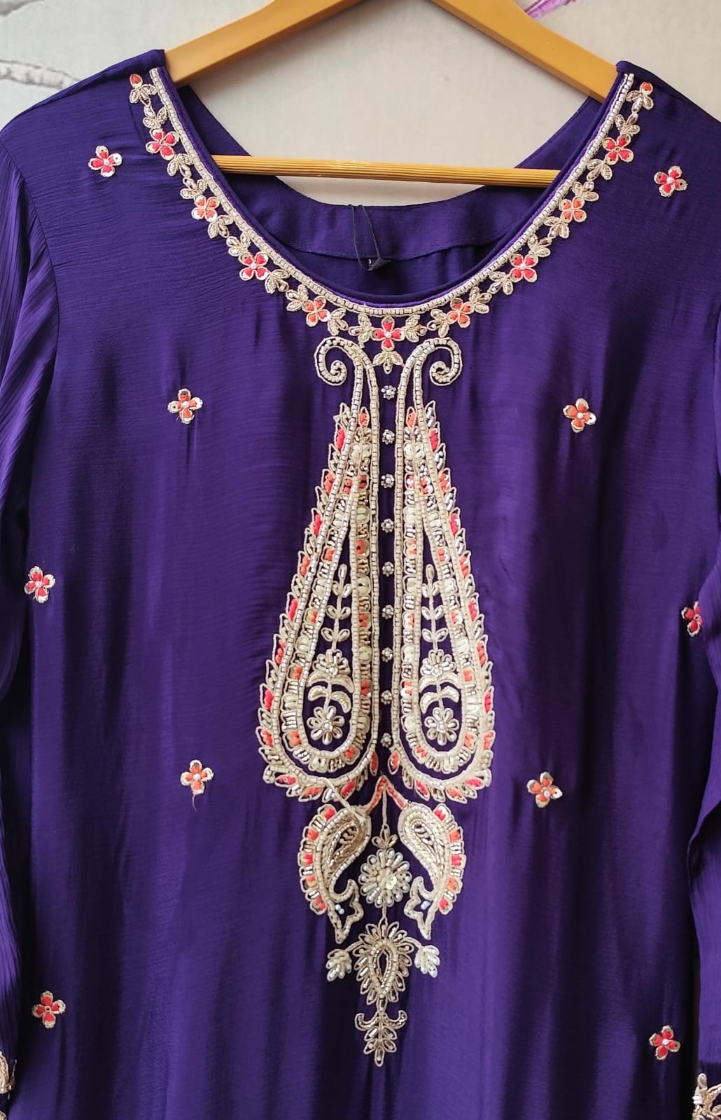 Beautiful purple heavy plazzo pant suit set with intricate detailing