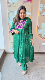 Premium crepe silk zari detailing and brocade highlight suit set in green n purple