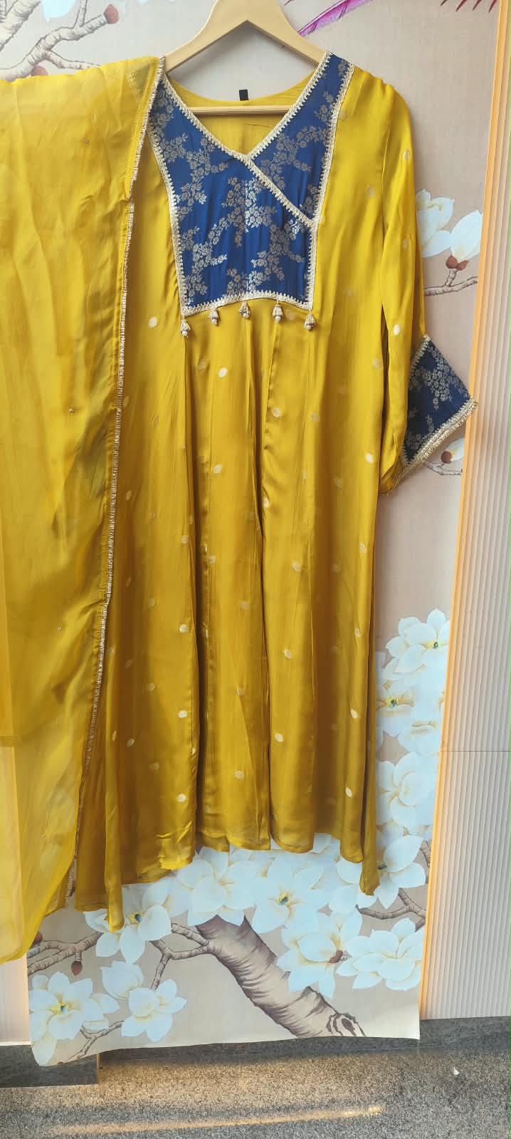Premium crepe silk zari detailing and brocade highlight suit set in yellow