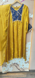 Premium crepe silk zari detailing and brocade highlight suit set in yellow