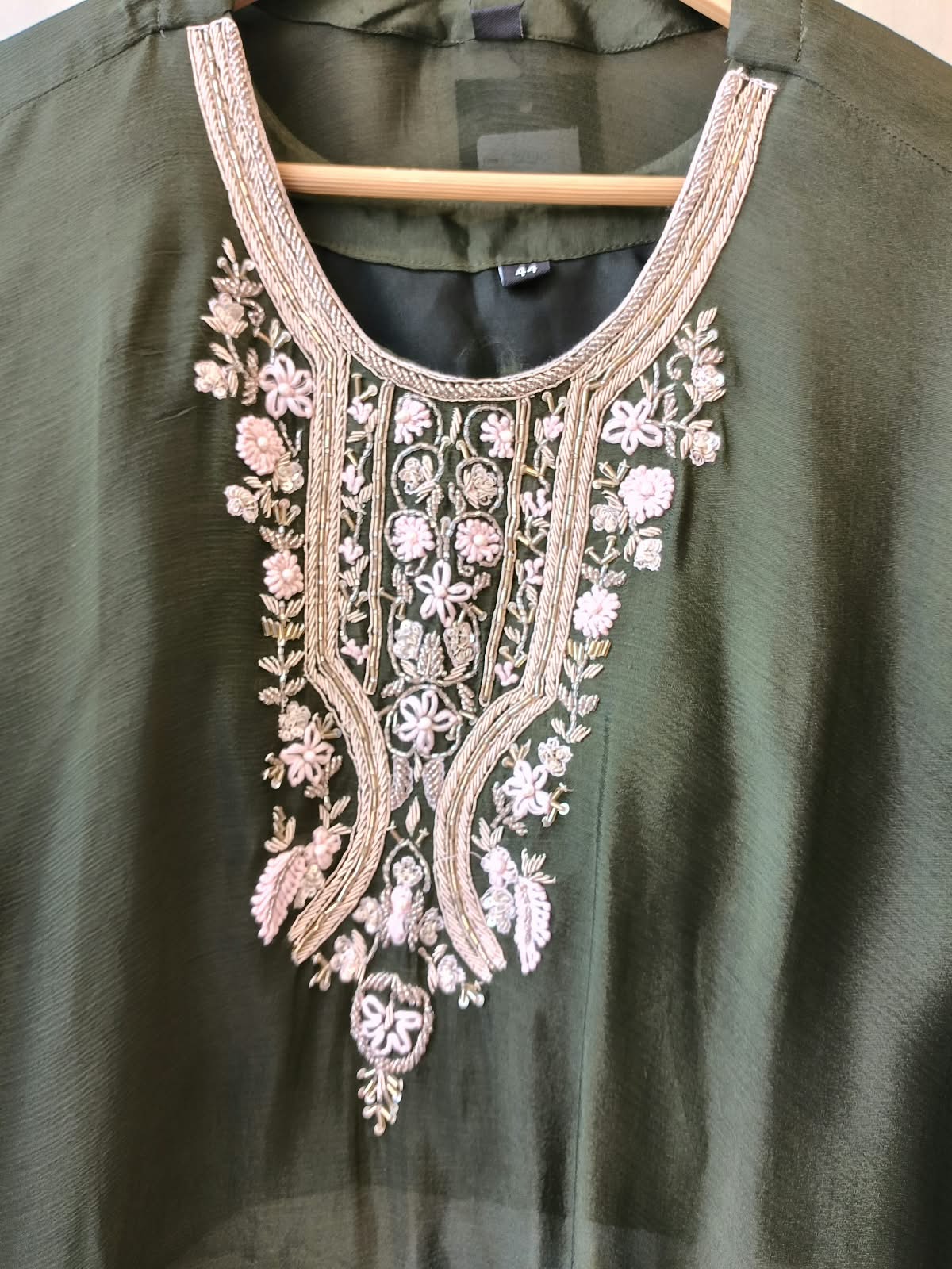 Pretty chinon hand word kaftan paired with brocade plazzo pants in green