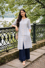 Super smart cotton checkered kurta paired with BLACK pant