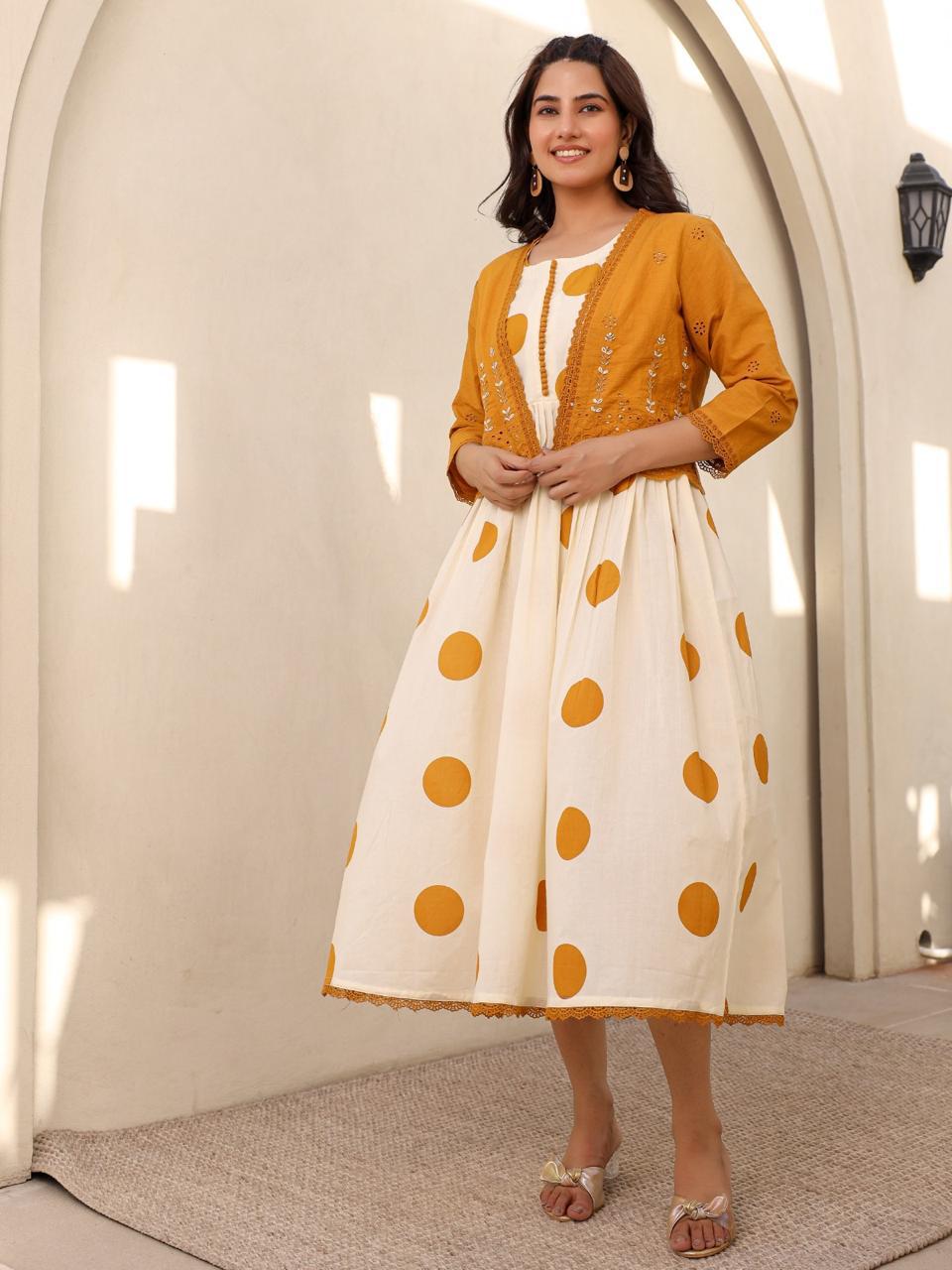 Pure cotton polka dot dress paired with beautiful embellished jacket