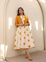 Pure cotton polka dot dress paired with beautiful embellished jacket