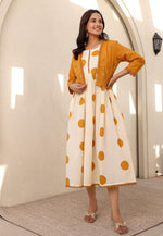 Pure cotton polka dot dress paired with beautiful embellished jacket