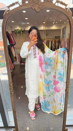 Super pretty neckline with beautiful shifli sleeves paired with a soft shiffon multi colour dupatta silk suit