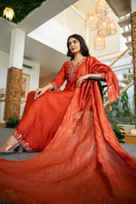 Russian silk with hand work on yoke and beautiful shimmer dupatta