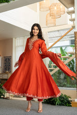 Russian silk with hand work on yoke and beautiful shimmer dupatta