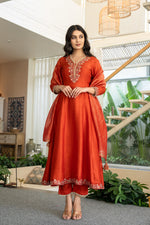 Russian silk with hand work on yoke and beautiful shimmer dupatta