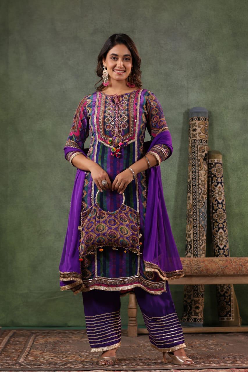 Crepe silk with gotta and lace detailing comes with a bag in purple !! Restock Dispatch after 15 days