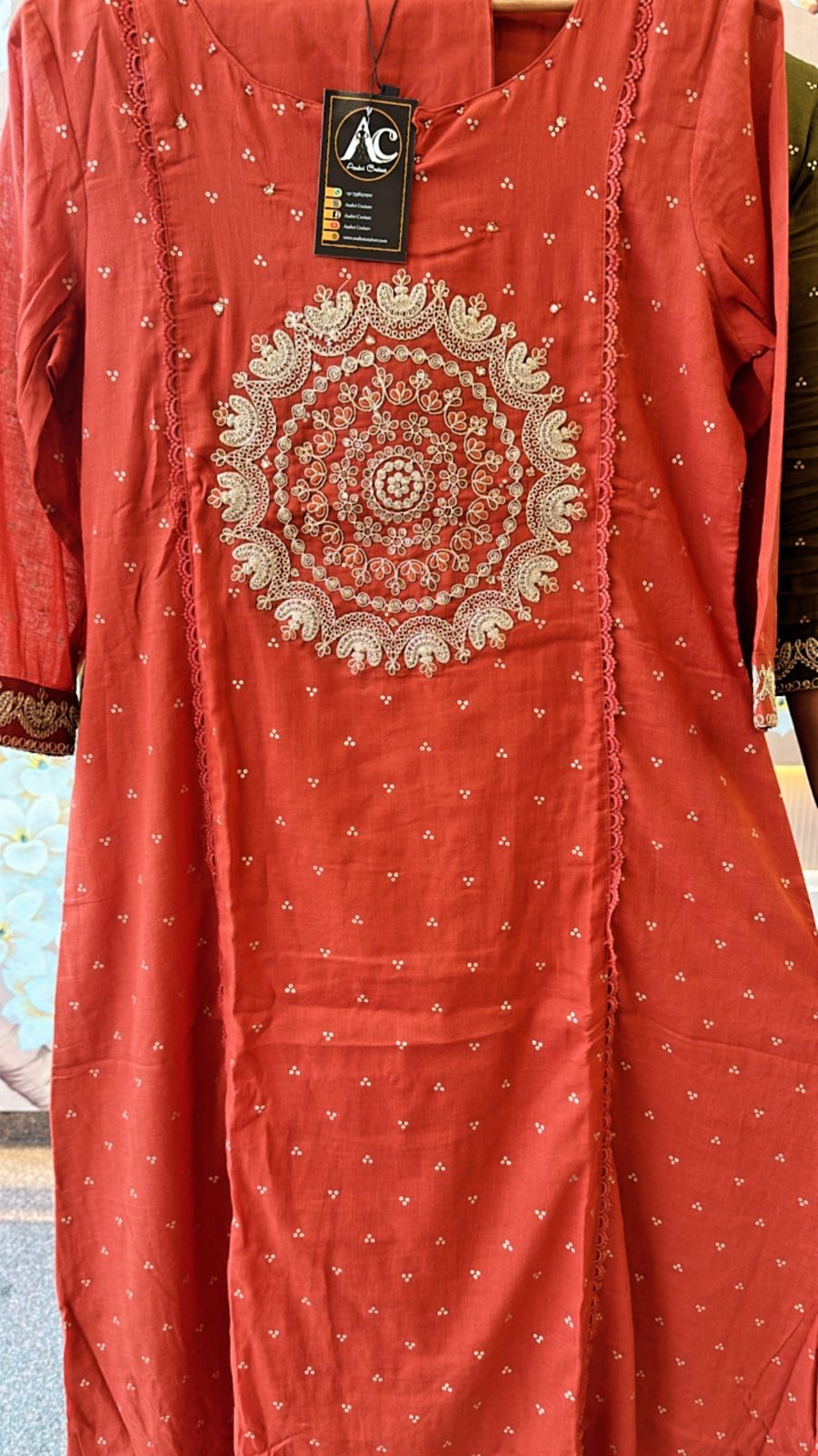 Beautiful rust Zari detailing suit set