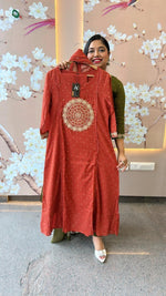 Beautiful rust Zari detailing suit set