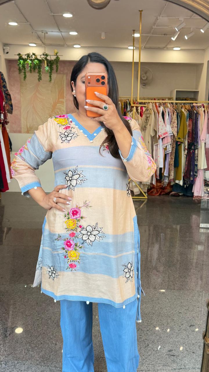Linen top with beautiful pearl detailing and katha detailing paired softest denim pants
