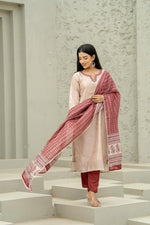 Silk suit set with lining paired with a contrast dupatta