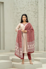 Silk suit set with lining paired with a contrast dupatta