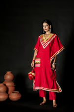 Beautiful kaftan in muslin with potli in red for this festive season