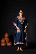Beautiful kaftan in muslin with potli in blue for this festive season