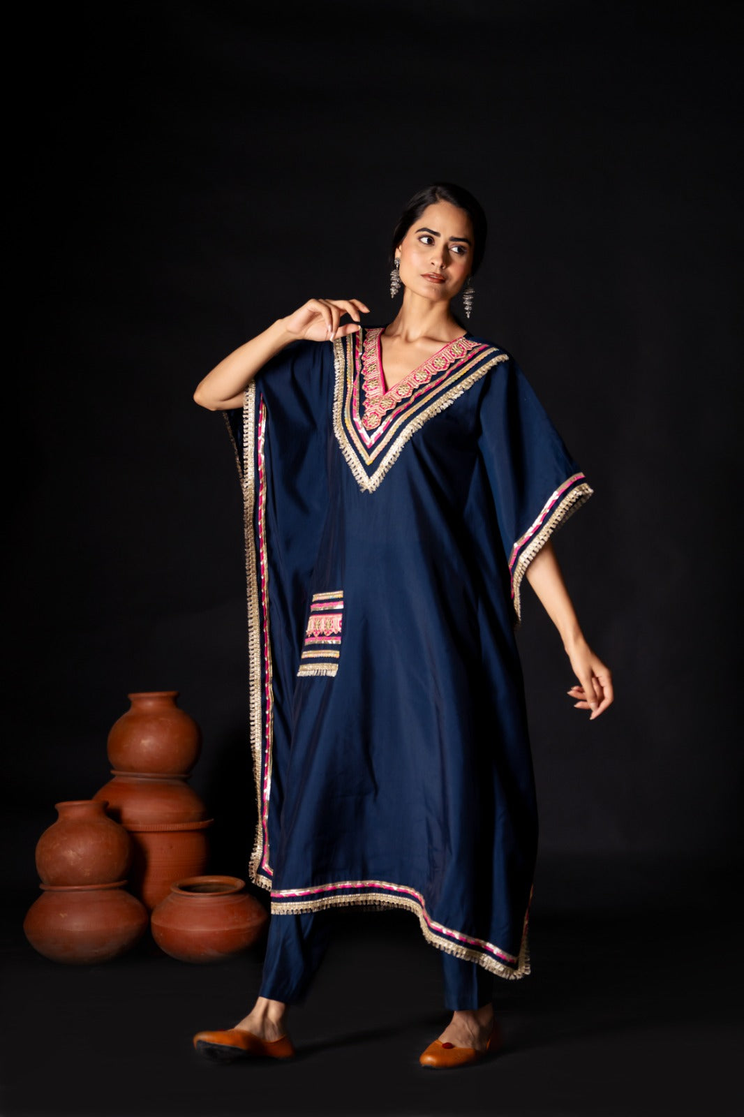 Beautiful kaftan in muslin with potli in blue for this festive season