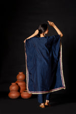 Beautiful kaftan in muslin with potli in blue for this festive season