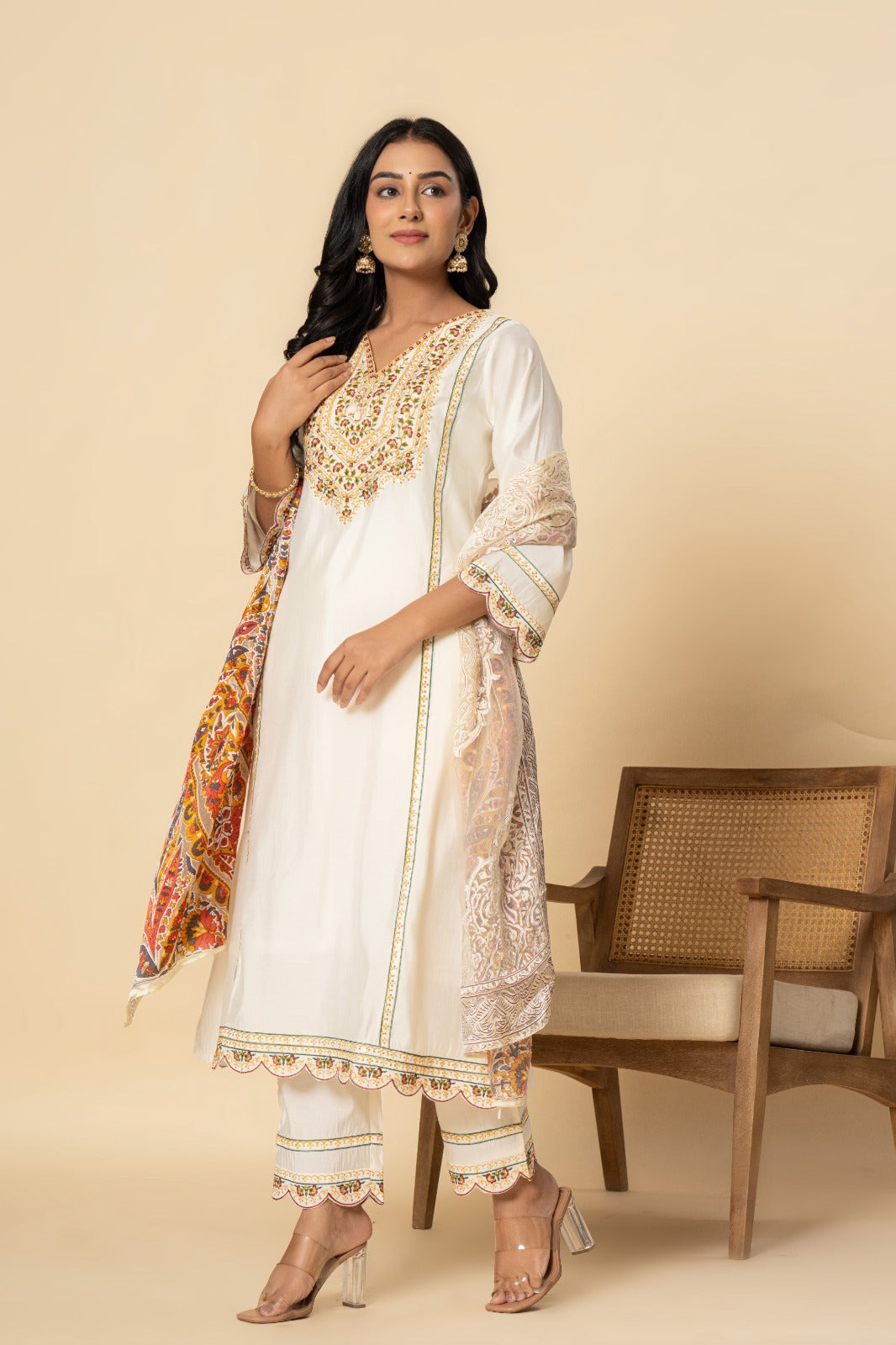 Premium Muslin embroidery paired with brasso dupatta