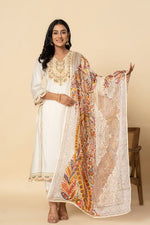 Premium Muslin embroidery paired with brasso dupatta