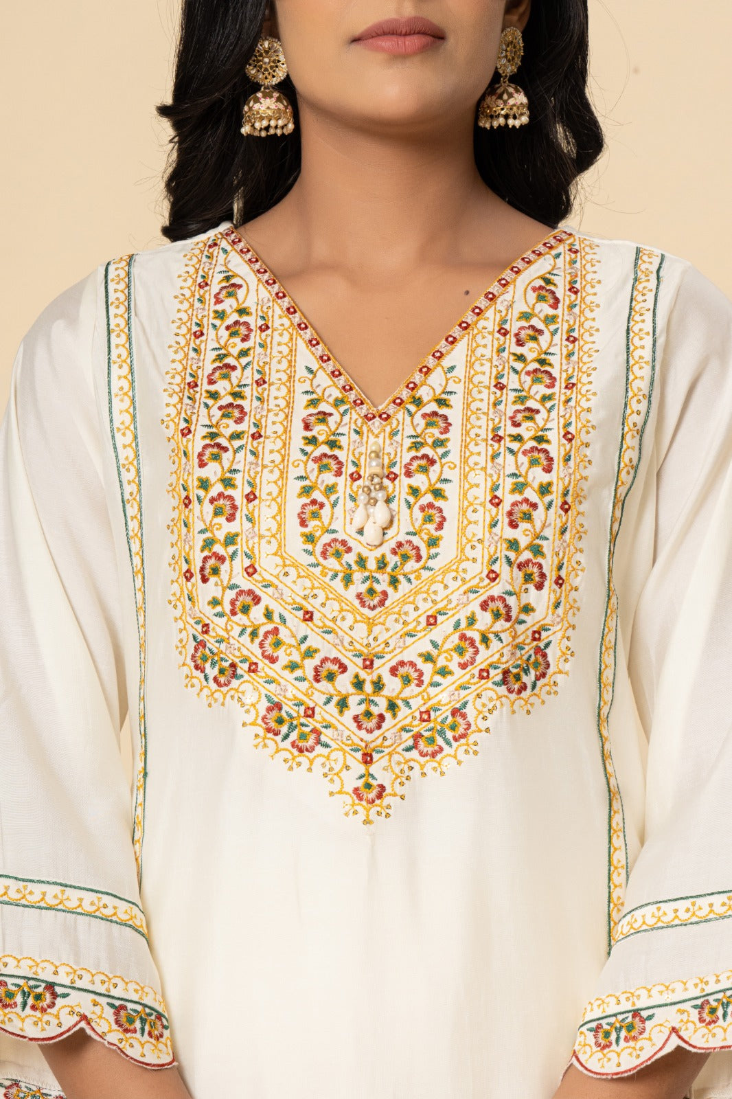 Premium Muslin embroidery paired with brasso dupatta