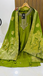 Heavy dola silk with heavy handwork and paired with brocade dupatta