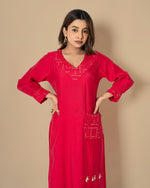Festive muslin V neck mirror work embellished kurta pant