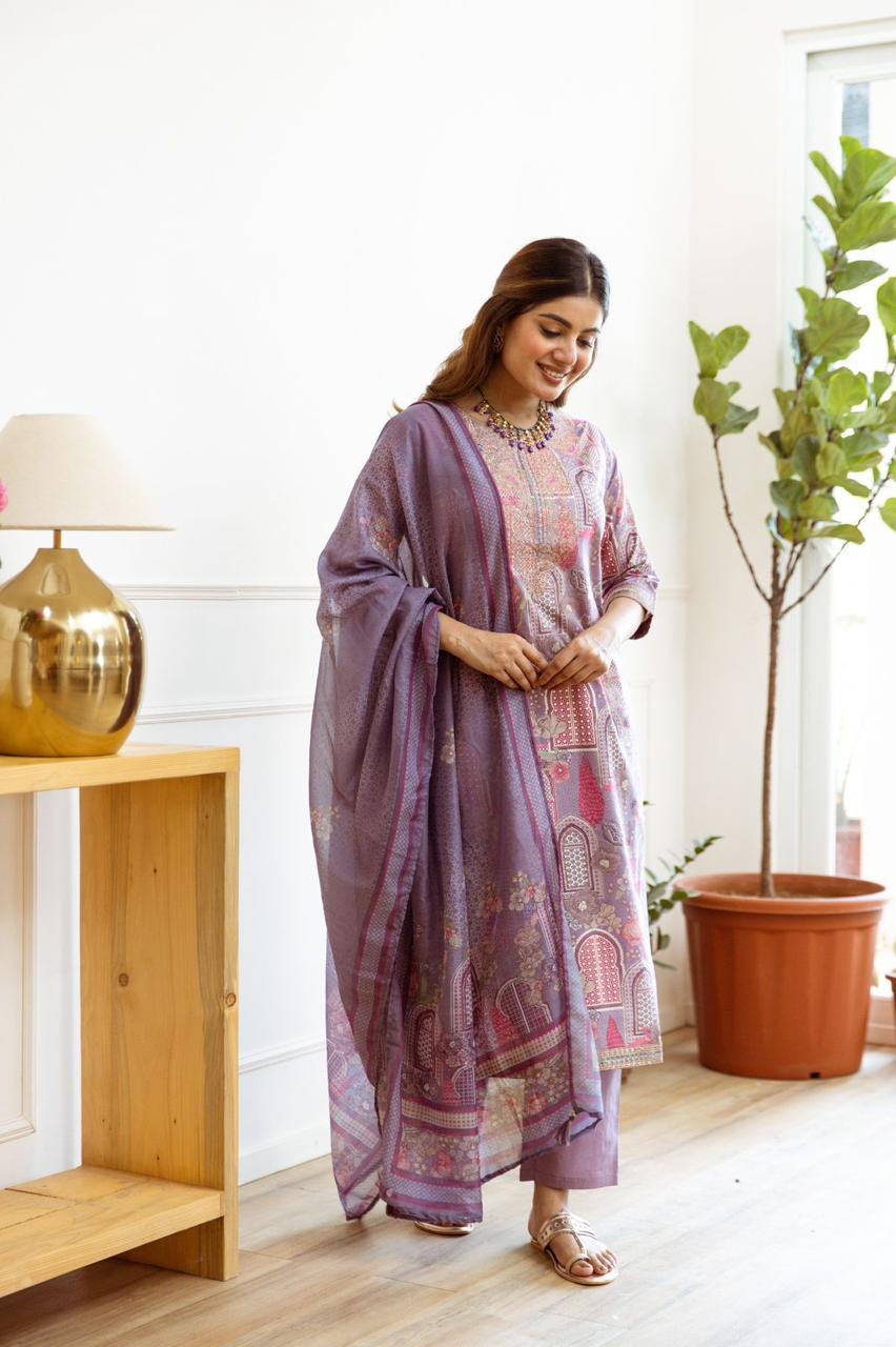 Premium cotton suit with zari embroidery and paired with soft organza dupatta