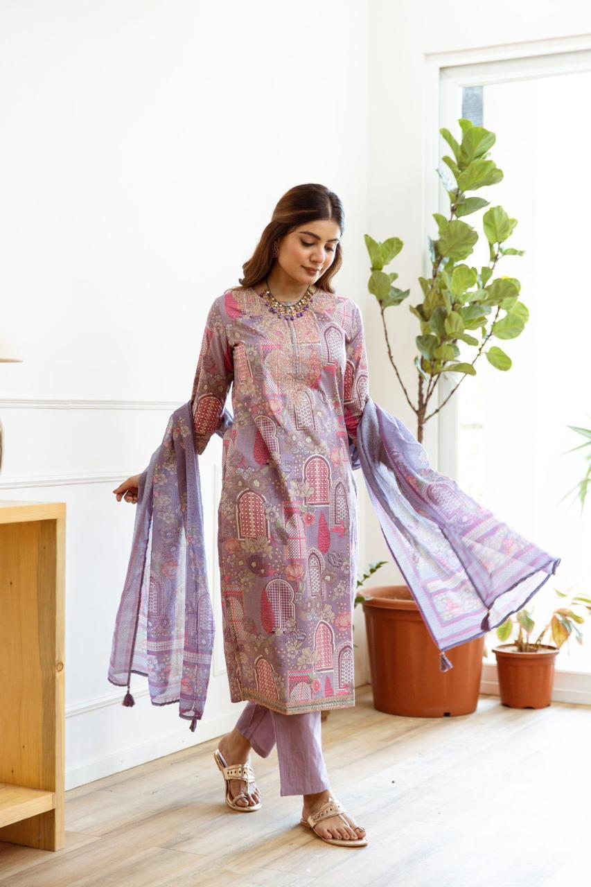 Premium cotton suit with zari embroidery and paired with soft organza dupatta