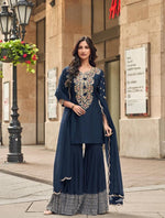 Pretty embellished silk suit paired with georgette sharara and orgenza dupatta