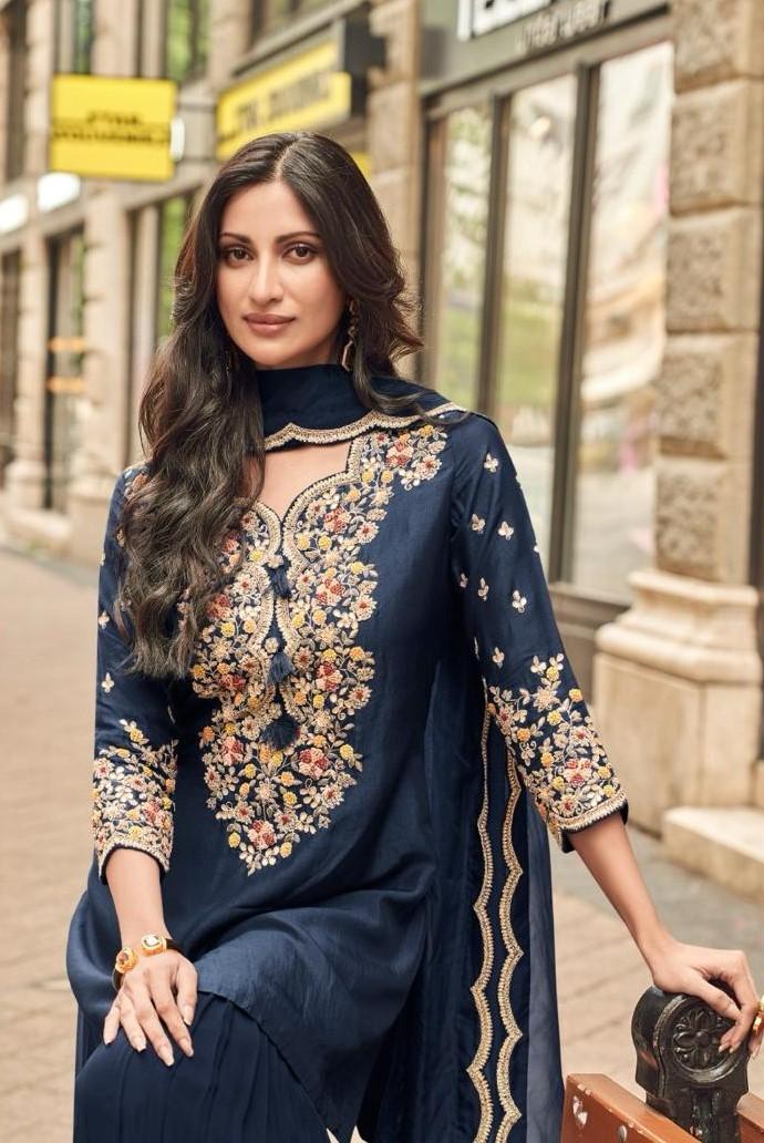 Pretty embellished silk suit paired with georgette sharara and orgenza dupatta