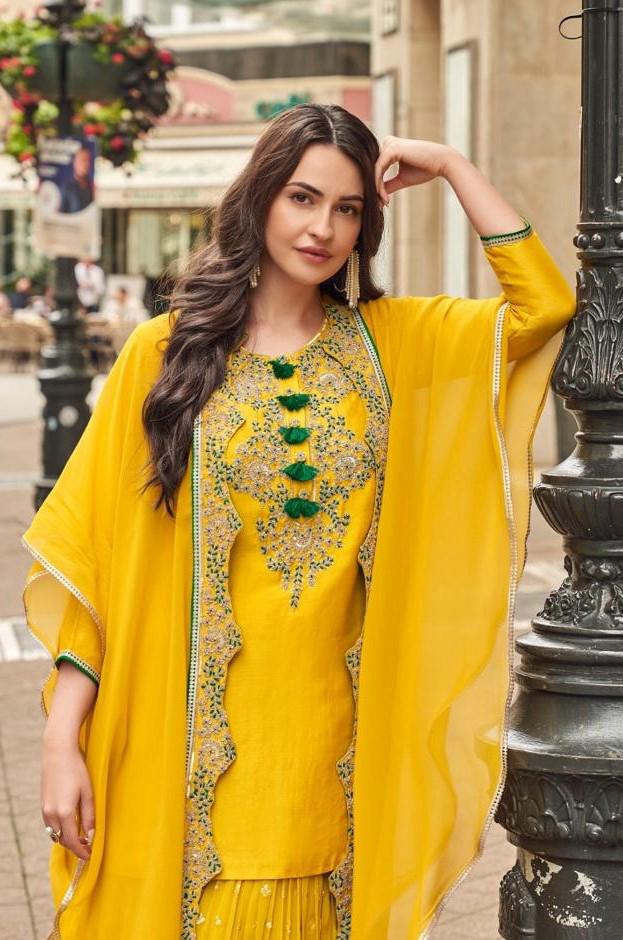 Pretty embellished silk suit paired with georgette sharara and orgenza shrug