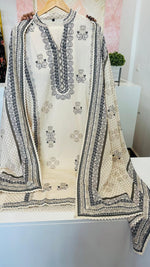 Premium cotton suit set paired with pretty dupatta